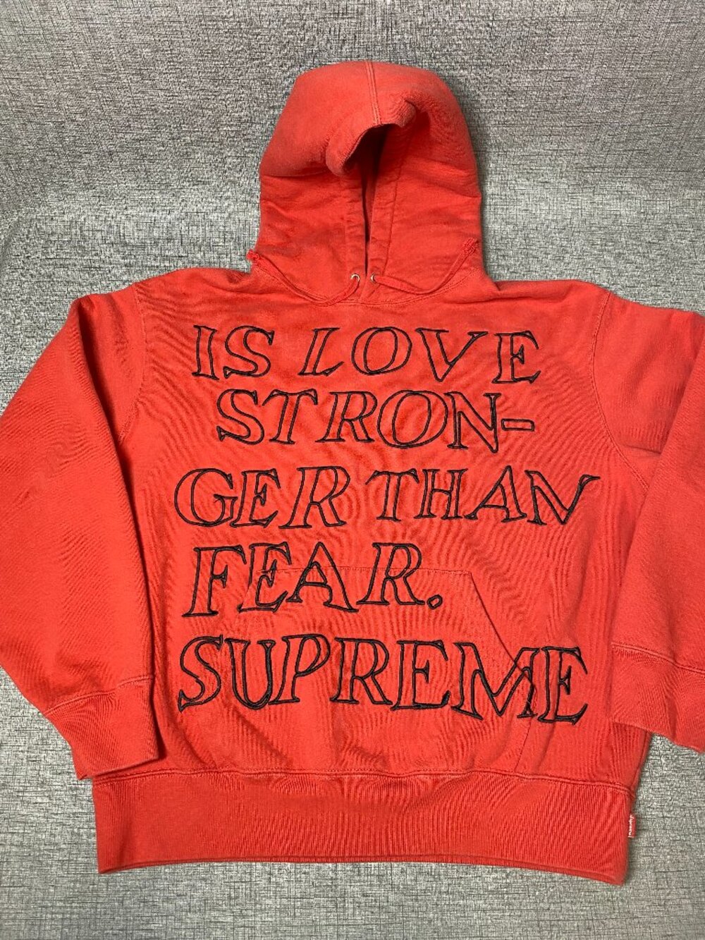 Supreme ‘Stronger than Fear’ Red Hoodie